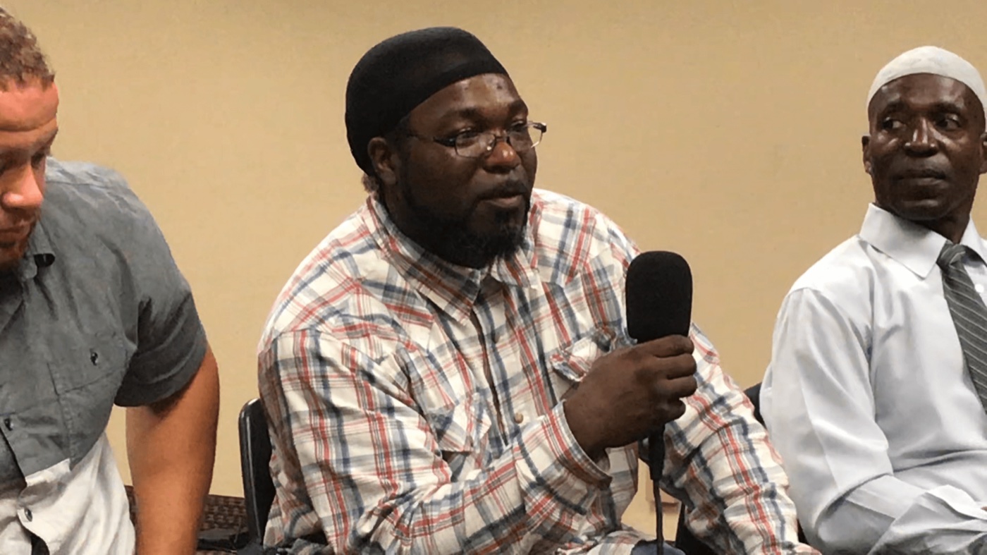 A community member speaking at Middle Ground