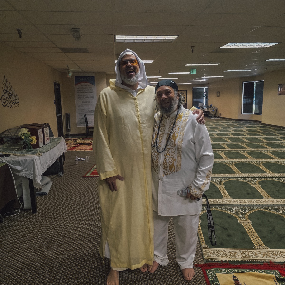 Community members in the prayer hall at Middle Ground